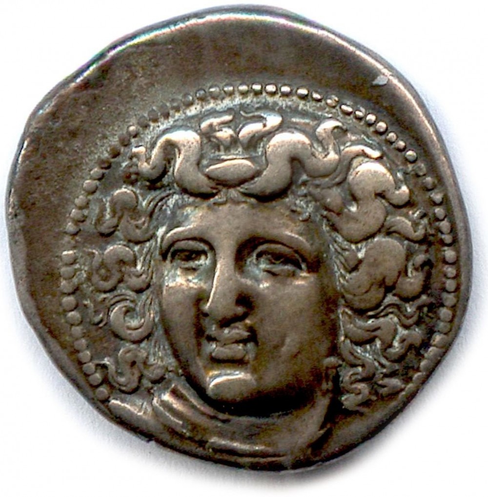 The iconographical influences of Larissa-Apollo Amphipolis coin type on Dacian issues from Oltenia and Transylvania, between 2nd and 1st century BC